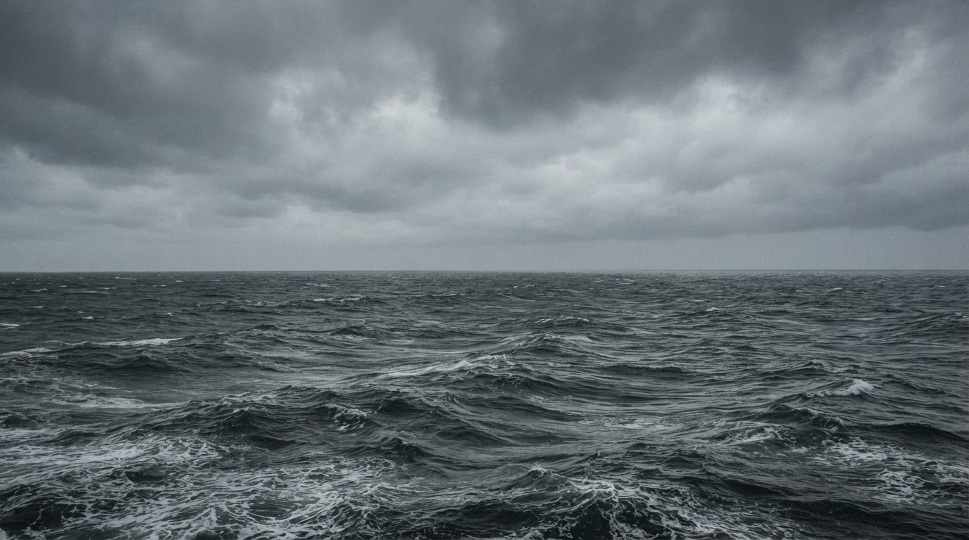 The gray water of the Sea of Okhotsk under a thick low ceiling of cloud, cold and empty (AI-generated image)