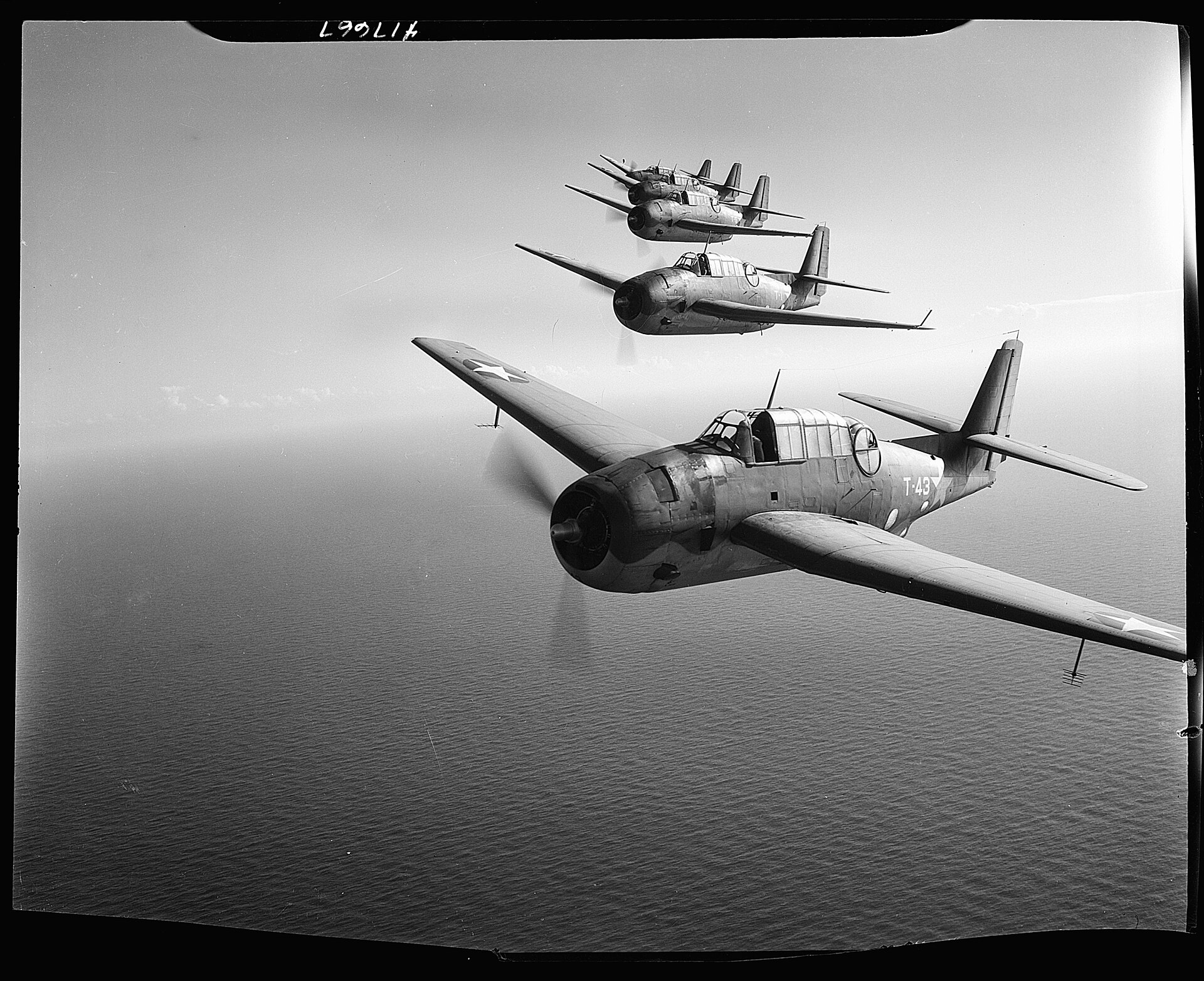 TBF Avengers flying in formation, photographed at Fort Lauderdale, Florida — an official US Navy photograph from the very base Flight 19 took off from (though not of Flight 19 itself).