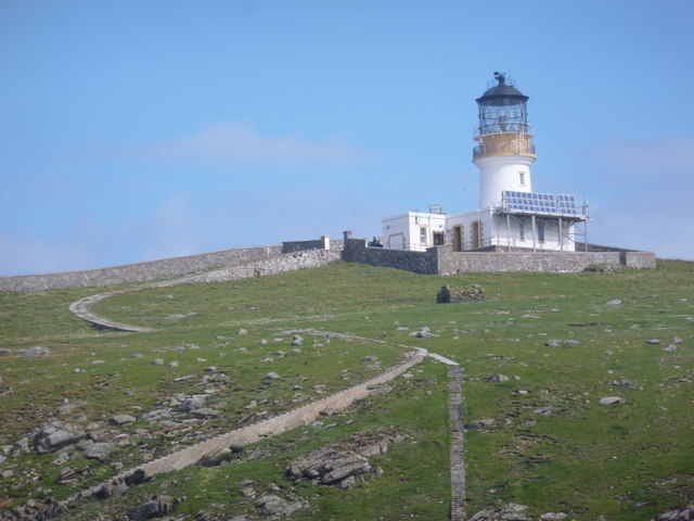 The lighthouse and the island seen from the sea to the south, on the approach that makes landing so difficult
