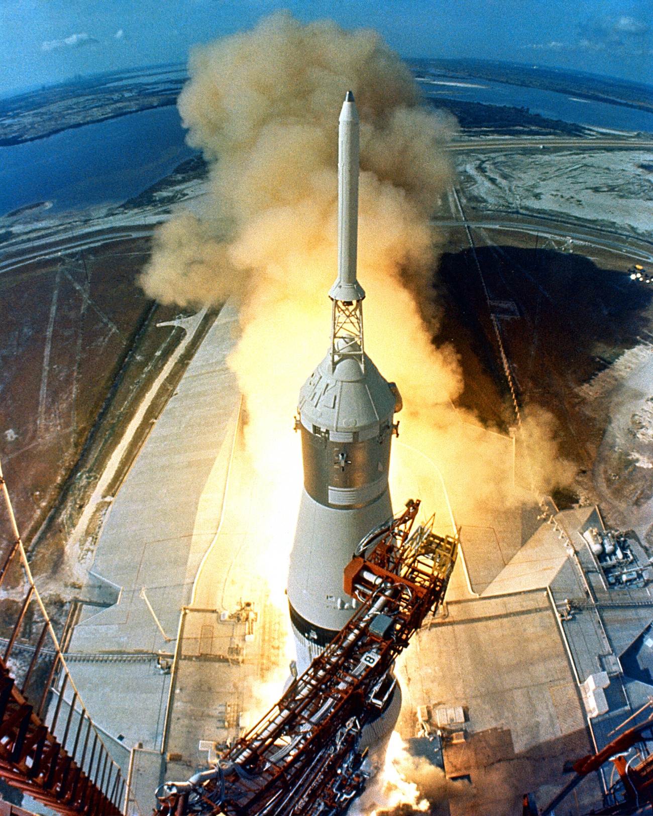 Apollo 11 lifts off atop a Saturn V rocket, July 16, 1969 — the mission that put the first humans on the Moon. (NASA; restored by Michel Vuijlsteke / Public domain)