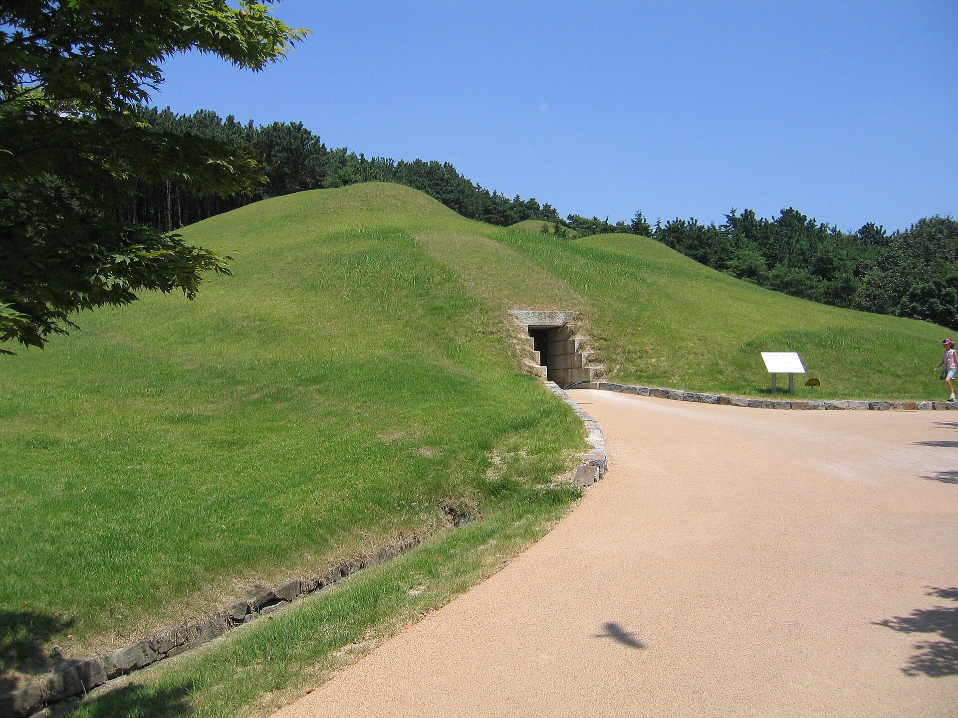 The burial mound and passage entrance of the Tomb of King Muryeong in the Songsan-ri tomb complex, Gongju