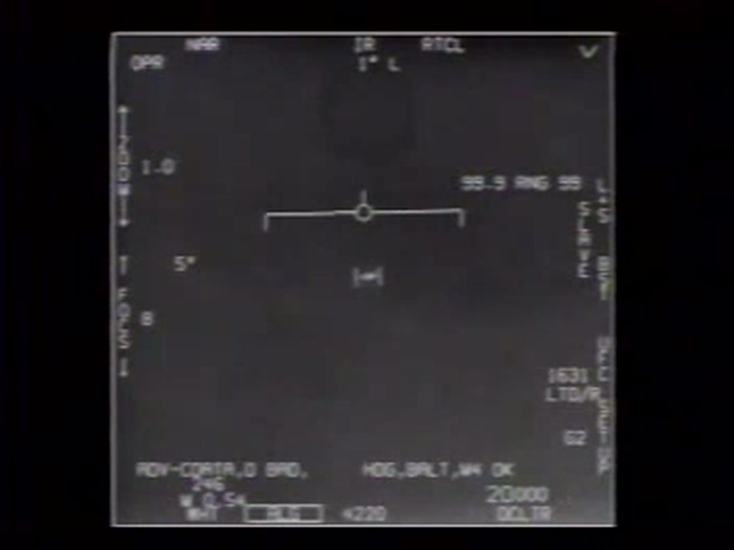 An actual frame from one of the Pentagon-released videos — the crosshairs are tracking the object. (US Navy / DoD, Public Domain)